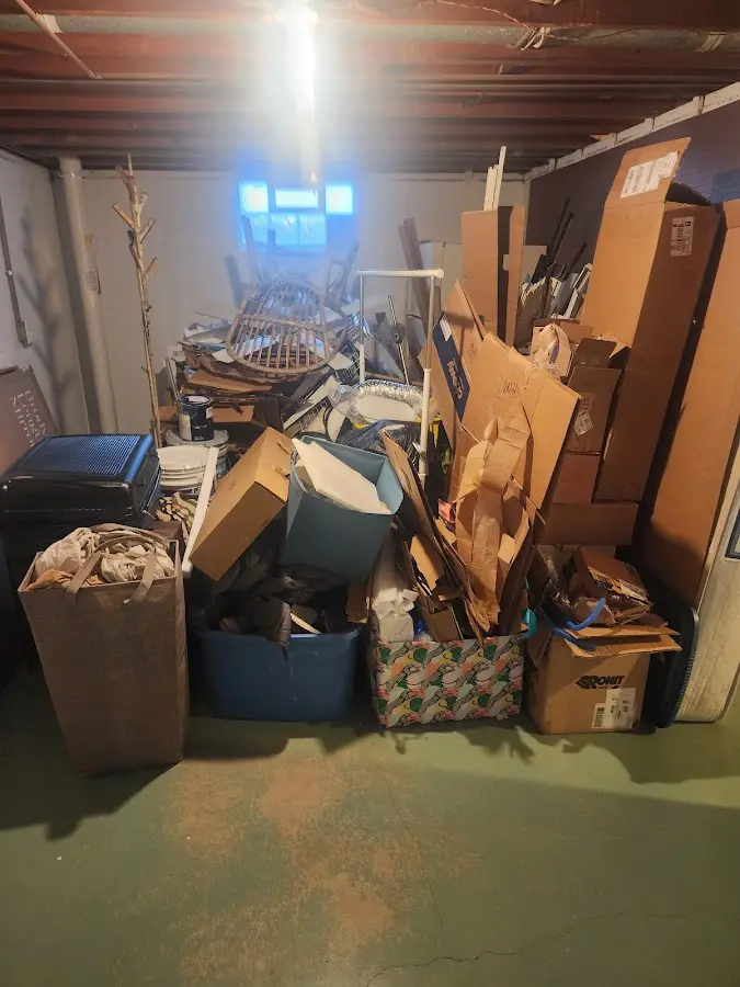 Roll-off dumpster container at job site for 4 Yard Dumpster Rental in Clare